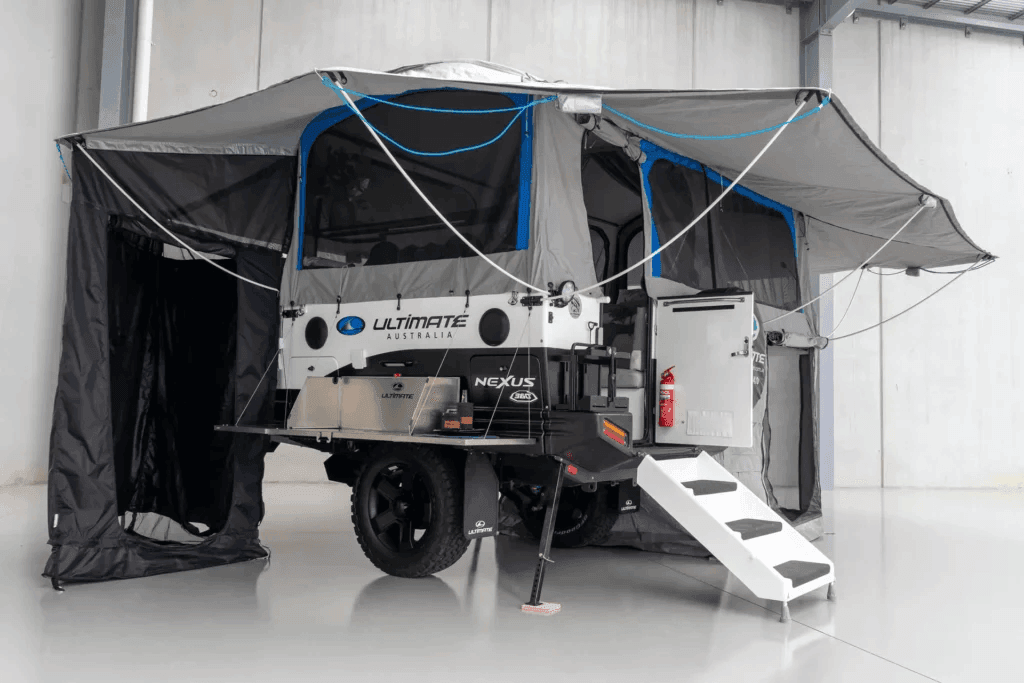 Ultimate Nexus camper fully opened to show its premium canvas walls, windows and surrounding awnings
